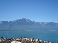 DSC05740  looking over at the Gramont from our balcony, Austin heard marching music and looked down into the school yard. There were people rehearsing for the August 1 parade!