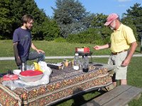 DSCN9146  Austin and Greg grilling at the pocket park on Ch. de Languedoc