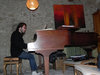 DSCN1113  Austin serenaded us on the piano