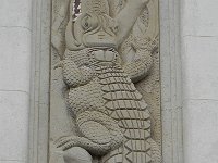 DSCN0621  These bas-reliefs on between windows of a building at 34 Rue Pasquier