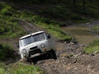 DSCN8108  We had to get out, to lower the vehicle weight and to give the driver free rein at getting out of this hole. Amazingly he did it!