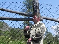 DSCN8254  Andrei, chief ranger for this part of the reserve in front of a fence for a red deer ranch