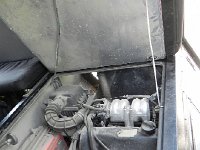 DSCN8265  It has a four cylinder engine amidship