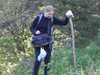 DSCN8301  Palia, in her Russian Army boots and tight pants (and camera bag), tried to cross on a log that was high above the stream. But it was too high...