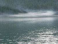 DSCN8328  smoke rises from the campers at the lake edge