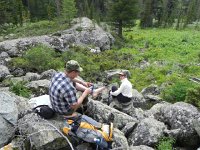 DSCN8378  After slogging for a km through soggy streamside we emerged on a talus slope to start the climb toward the glacier and the data loggers