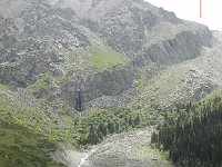 DSCN7702  Our route will take up from L to R beneath the waterfall, up the moraine beneath the cliffs to a hut out of sight but roughly beneath the arrow