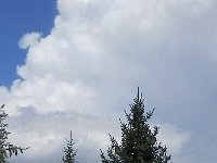 DSCN7815  Central Asian sky with carved dolmen in a small park in the school yard