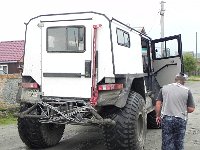 DSCN8530  We went by the expensive hotel to pay our respects to the Reserve Director, and what should we see but the Super Mobile back from the dead! I wonder how they fixed it!