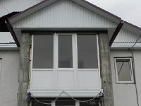 DSCN8531  I took this photo to remind myself of 1) uneven heights of stairsteps (which provoked at least two falls on my part in Russia) and 2) the extensive use of expanding orange polyurethane foam, especially picturesque as chinking in log cabins