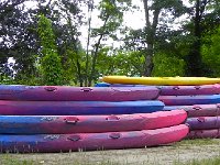 DSCN7541  Plastics kayaks stacked up for us tourists