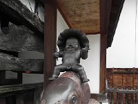 DSCN0175  Riding a carp in the old town of Takayama