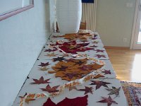 DSC06419  Credenza with this year&#39;s harvest of sweet gum leaves