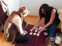 DSCN0397  Noa teaches Charlotte Mondale the rules of SET