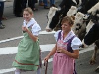 DSC06057  Swiss milkmaids with high-tec hikers and some kind of drink