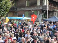 DSCN9733  Meanwhile in the distance, flag flinging and alpine horns