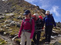 IMG 0577  Kate, Sarah and Bri crest the pass.