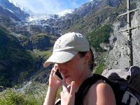 DSCN2322  Brigitte pursuing real estate deals on the way up the hill.