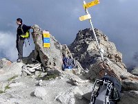 DSCN2150  We scrambled up the scree to the Col des Becs...where Nico checks out the view.