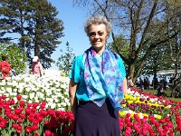 against the flowers  and just stand in front of them for your photo.