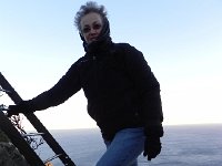 DSCN2912  Christine climbing to the viewpoint bundled against the wind