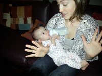 20141206 214210  Val takes a bottle for the first time and holds it herself!