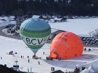 DSCN1230  The weather wasn&#39;t good for flying, but the organizers managed to inflate a few of the sponsors&#39; balloons to give the tourists something to look at.