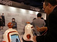 20140109 095602  Dozens of booths about robots
