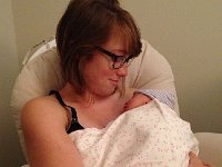 IMG 0255  She handles her new baby with great tenderness.