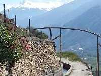 20140504 105126(0)  The bisse itself with a monorail, which links the vineyards to roads lower down, crossing over it