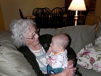 DSCN2565  Grandma communing with the next generation