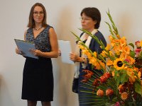 DSC00696  Brigitte getting her diploma plus a prize for the highest grade point average