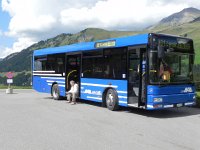 DSCN4470  Reading while waiting for the bus to take us down to the train station