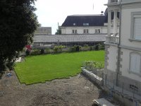 DSCN4407  Rolling out a new lawn above the station.