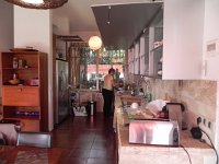 DSCN5990  Christine providing the juice for family transactions