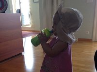 IMG 1572  Milk in a green cup with a straw. She&#39;s probably the only child Christine has ever permitted to walk around the house with food and/or drink