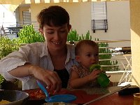 20150715 193908  Now, third night dinner out on the balcony involves less food play, but not much eating either.