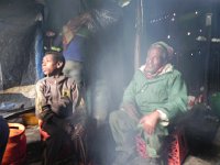 DSCN4028  and then drove, through the rain, to Chenek Camp, when again the best place to hang out was in the cook cabn.