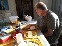 20150510 082915  Enjoying the paper...