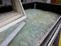 20160423 171650  23 April - building renovation leads to a trailer full of broken windows