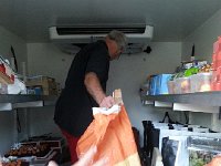 IMG 0343  The groom handin out stuff