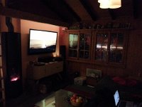20160212 192847  Fireplace is gone, replaced by iTV and wood stove.