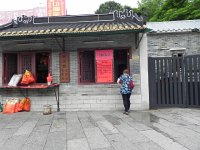 DSCN6410  Nikki buying tickets to the temple