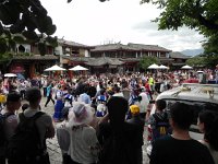 DSCN6531  watching the Naxi cajol the Chinese tourists into a circle dance