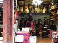 DSCN6535  in the case, drums played by Naxi-like ladies