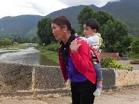 DSCN6631  Naxi lady and prog