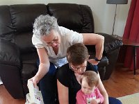 20160530 111357  The threee generations stacked up over a book