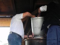 DSCN7501  A demonstration of cheese making with chauderon