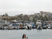 DSCN3735  young woman, boats and old warehouses