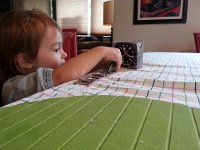 20170427 074922  driving her Playmobile over a watchband highway to meet the big clock